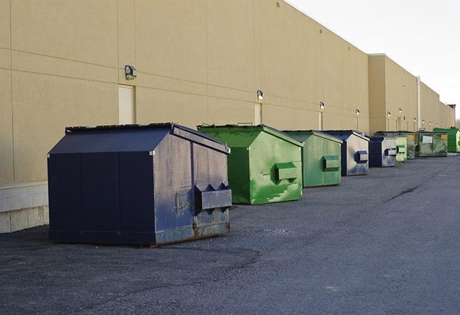 construction dumpsters stacked in a row on a job site in Bend OR